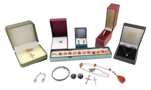 A group of costume jewellery and effects, comprising a silver child's bangle, two silver...