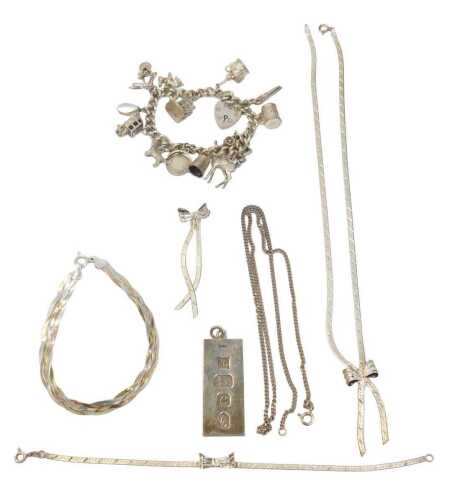 A group of silver and other jewellery, comprising a silver tricolour woven bracelet, 14cm long,...