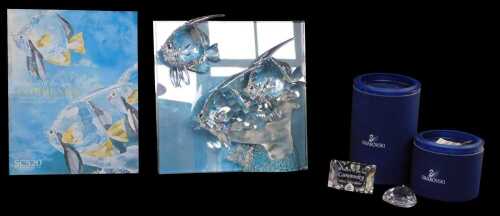 A Swarovski Wonders of the Sea sculpture titled Community, boxed with paperwork and carrying bag,...