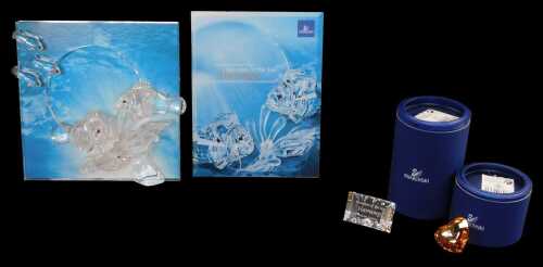 A Swarovski crystal Wonders of the Sea group titled Harmony, together with a name plaque and...