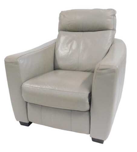 A contemporary pale grey leather electric reclining armchair, with power lead.