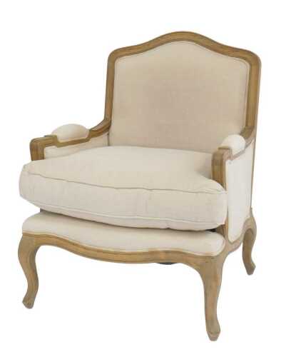 A contemporary oak show-framed armchair in the French style, with a calico overstuffed...