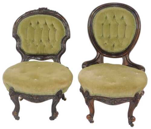Two Victorian mahogany nursing chairs, upholstered in buttoned green draylon fabric, one with a...