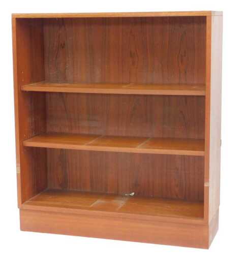 A G-Plan teak open bookcase, with three shelves, raised on a block base, bearing label, 91cm...