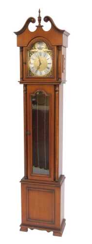 A 20thC longcase clock, the brass face with a silvered chapter ring, with cherub spandrels and...