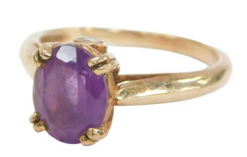 A 9ct gold Gems TV amethyst dress ring, with an oval cut amethyst in a four double claw basket...