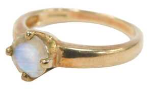 A 9ct gold Gems TV moonstone set dress ring, the circular stone in a four claw basket setting,...
