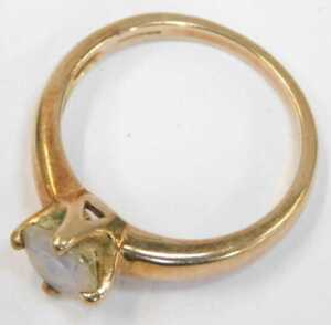 A 9ct gold Gems TV moonstone set dress ring, the circular stone in a four claw basket setting,... - 2