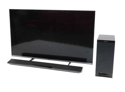 A Panasonic 50" television, model TX-50CS520B, with lead and remote, together with a Panasonic...