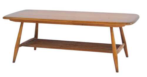 An Ercol elm coffee table, the rectangular top with a rounded edge, with a slatted under tier,...