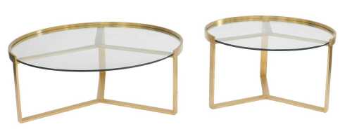 A contemporary glass topped occasional table, the circular top within a brassed part surround,...