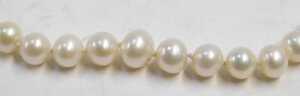 A cultured pearl single strand necklace, on an orb shaped clasp, yellow metal, marked 14K, 73cm... - 2