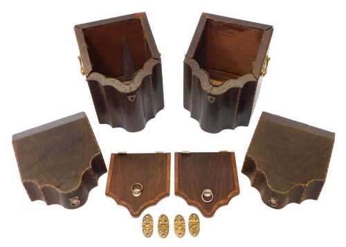 A pair of George III mahogany and inlaid caddies, each of serpentine form, the hinged lid...
