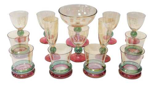 A group of Krosno Poland drinking glasses, each piece amber tinted with a green and cranberry...