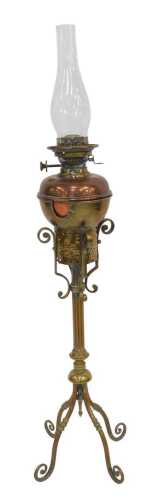 A Victorian brass oil lamp, with a Hinks No. 2 duplex burner with copper central reservoir, with...