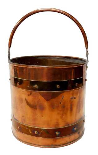 A late Victorian copper and brass banded log or coal bucket, with a swing handle, 26cm high.