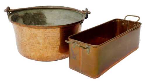 An early 20thC hammered copper preserve pan, with a wrought iron swing handle, 36cm diameter,...