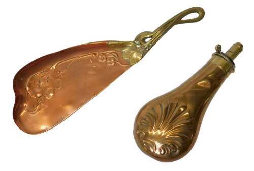 A James Dixon and Sons copper and brass shot flask, together with an Art Nouveau copper and...