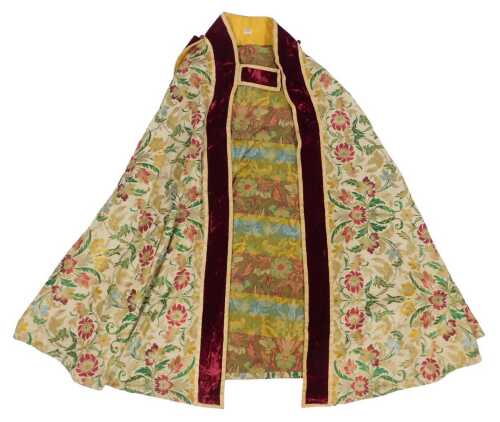 Ecclesiastical interest. A bishop's cope, heavily embroidered with flowers and birds in the...