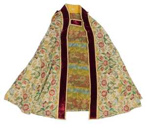Ecclesiastical interest. A bishop's cope, heavily embroidered with flowers and birds in the...