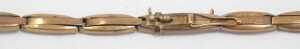 An expanding watch bracelet, yellow metal stamped 9ct, 14cm long, 3.5g. - 2