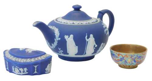 A Wedgwood dark blue Jasperware teapot and cover, printed mark, an Oriental tea bowl, decorated...