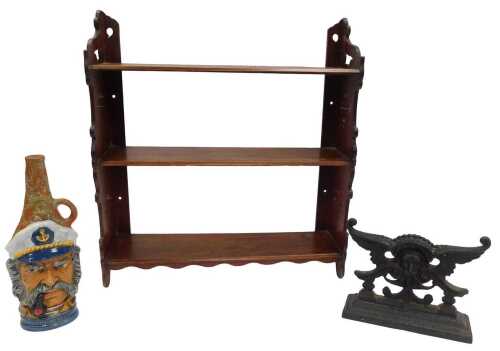An early 20thC oak wall shelf, with shaped sides, 55cm high, 50cm wide, a Victorian cast iron...