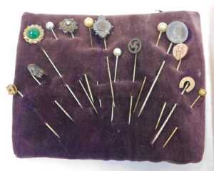 A collection of hat pins, comprising four silver topped hat pins to include horseshoe, floral... - 2