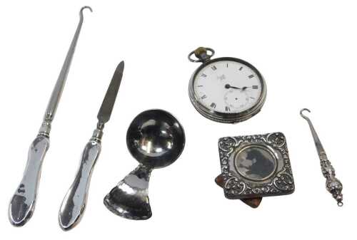 A group of small silver, to include a silver handled nail file and button hook, a Limit No. 2...