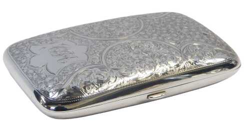 An Edward VII silver cigarette case, bright cut engraved with leaf and scrolling motifs,...