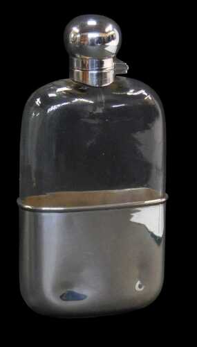 A Victorian glass and silver mounted hip flask, with a silver lid and removable sleeve to the...