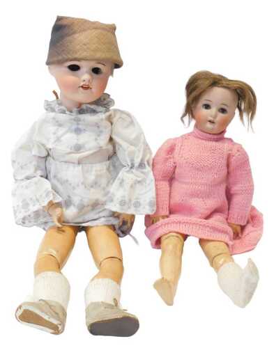 A Welsch and Co German porcelain faced doll, with painted wooden joints, numbered 301, 36cm high,...