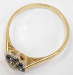 A sapphire and diamond floral cluster ring, the round brilliant cut diamond surrounded by six... - 2