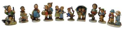 A group of Goebel Hummel figures, to include Mountaineer, Stormy Weather, Surprise, Visiting an...