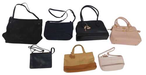 Six leather Radley handbags, each with a pink dust bag, and a Modalu lady's pink handbag, with a...