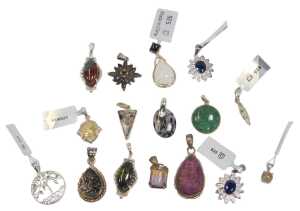 A quantity of pendants, to include silver stone and floral clusters, rough cut, agate, and...