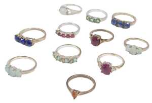 Ten stone set dress rings, each white metal stamped 925, to include imitation garnet, imitation...