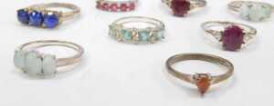 Ten stone set dress rings, each white metal stamped 925, to include imitation garnet, imitation... - 2