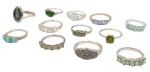 Twelve stone set dress rings, each white metal stamped 925, to include cz, pale green set stones,...