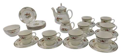A Royal Doulton porcelain Kingswood pattern part tea service, to include eight cups and various...
