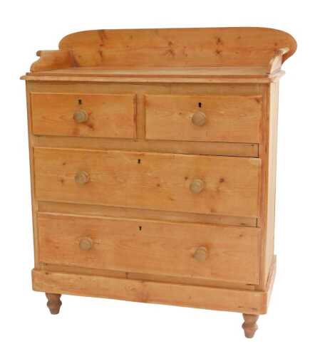 A pine chest, with a raised back above two short and two long drawers, raised on turned legs,...