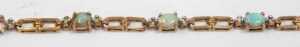 An opal and diamond line bracelet, with a two-sectional link bracelet, yellow metal stamped 9ct,... - 3