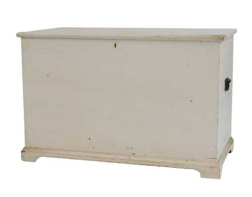 A white painted pine blanket chest, the hinged lid enclosing vacant interior, with wrought iron...