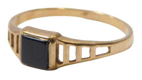 A 9ct gold black onyx signet ring, the ring head square set, on pierced and stepped shoulders,...