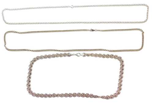 Three neck chains, comprising a knot twist link neck chain, white metal stamped 925, 44cm long,...