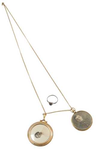 Two early 20thC photograph lockets, comprising a circular portrait locket depicting two military...