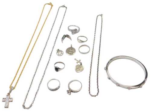 A Swarovski crystal bangle, no. 5080045, boxed, a Swarovski crystal pendant cross and chain, a...