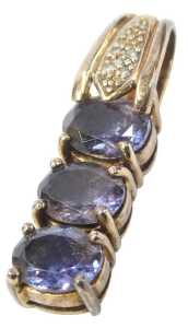 A 9ct gold pendant, the top set with tiny diamonds, with a three oval cut amethyst drop, 3cm...