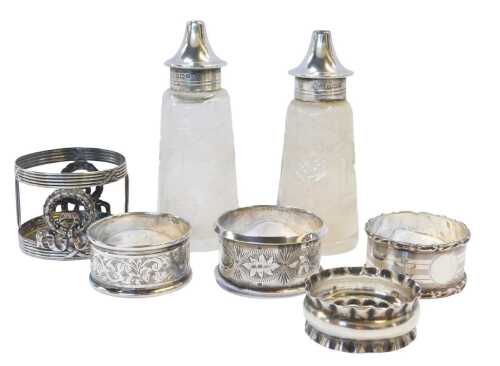 A group of small silver, to include an Edward VII silver bottle stand, with laurel leaf and swag...