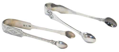 A pair of Edward VII silver sugar tongs, Sheffield 1908, together with a further pair, 1.25oz.